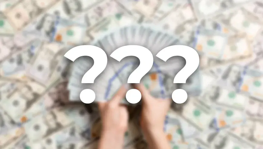 Dollar bills with question marks